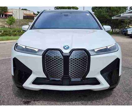 2025 BMW iX xDrive50 is a White 2025 BMW 325 Model iX SUV in Loveland CO