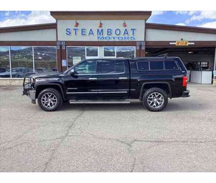 2014 GMC Sierra 1500 SLT is a Black 2014 GMC Sierra 1500 SLT Truck in Steamboat Springs CO