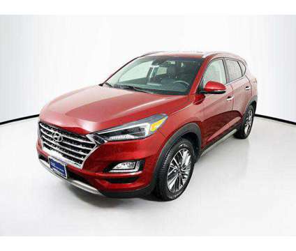 2019 Hyundai Tucson Limited is a Red 2019 Hyundai Tucson Limited SUV in Madison WI
