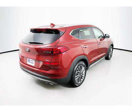 2019 Hyundai Tucson Limited is a Red 2019 Hyundai Tucson Limited SUV in Madison WI