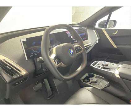 2025 BMW iX xDrive50 is a Black 2025 BMW 325 Model iX SUV in Freeport NY