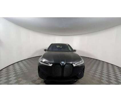 2025 BMW iX xDrive50 is a Black 2025 BMW 325 Model iX SUV in Freeport NY