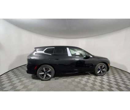 2025 BMW iX xDrive50 is a Black 2025 BMW 325 Model iX SUV in Freeport NY