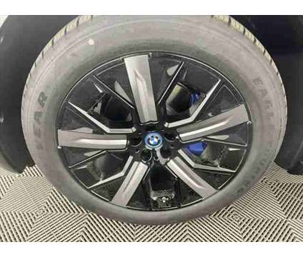 2025 BMW iX xDrive50 is a Black 2025 BMW 325 Model iX SUV in Freeport NY