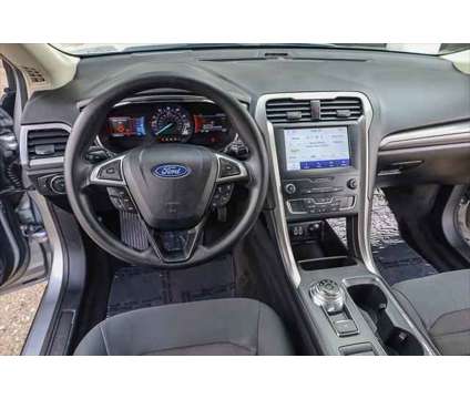 2020 Ford Fusion SE is a Silver 2020 Ford Fusion SE Sedan in San Luis Obispo CA