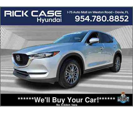2021 Mazda CX-5 Touring is a Silver 2021 Mazda CX-5 Touring SUV in Fort Lauderdale FL