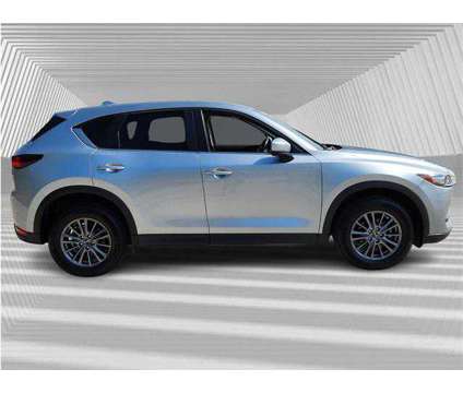 2021 Mazda CX-5 Touring is a Silver 2021 Mazda CX-5 Touring SUV in Fort Lauderdale FL