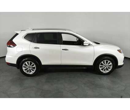 2018 Nissan Rogue SV is a White 2018 Nissan Rogue SV Station Wagon in Orlando FL