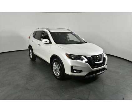 2018 Nissan Rogue SV is a White 2018 Nissan Rogue SV Station Wagon in Orlando FL