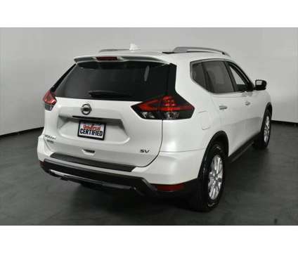 2018 Nissan Rogue SV is a White 2018 Nissan Rogue SV Station Wagon in Orlando FL