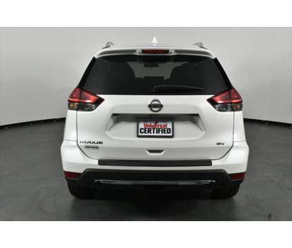 2018 Nissan Rogue SV is a White 2018 Nissan Rogue SV Station Wagon in Orlando FL