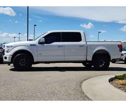 2015 Ford F-150 Platinum is a Silver, White 2015 Ford F-150 Platinum Truck in Loveland CO