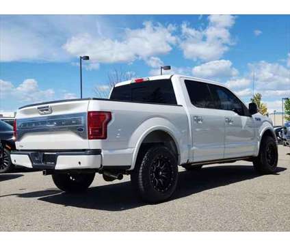 2015 Ford F-150 Platinum is a Silver, White 2015 Ford F-150 Platinum Truck in Loveland CO