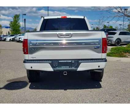 2015 Ford F-150 Platinum is a Silver, White 2015 Ford F-150 Platinum Truck in Loveland CO