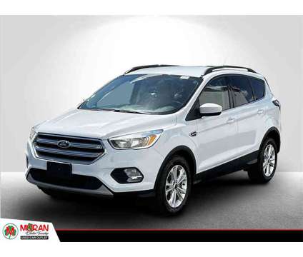 2018 Ford Escape SE is a White 2018 Ford Escape SE SUV in Clinton Township MI