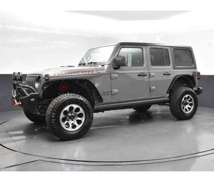 2021 Jeep Wrangler Unlimited Rubicon is a Grey 2021 Jeep Wrangler Unlimited Rubicon SUV in Jackson MS