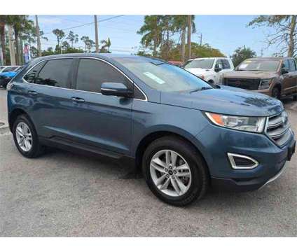 2018 Ford Edge SEL is a Blue 2018 Ford Edge SEL SUV in Naples FL