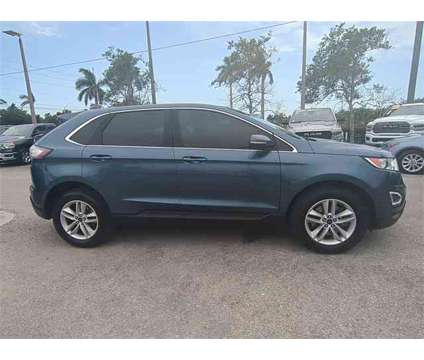 2018 Ford Edge SEL is a Blue 2018 Ford Edge SEL SUV in Naples FL