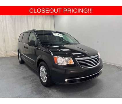 2014 Chrysler Town &amp; Country Touring is a Brown 2014 Chrysler town &amp; country Touring Car for Sale in Holland MI