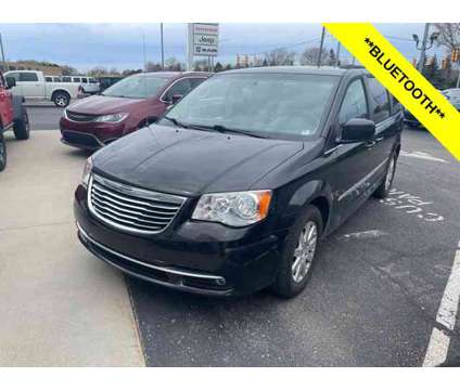 2014 Chrysler Town &amp; Country Touring is a Brown 2014 Chrysler town &amp; country Touring Car for Sale in Holland MI