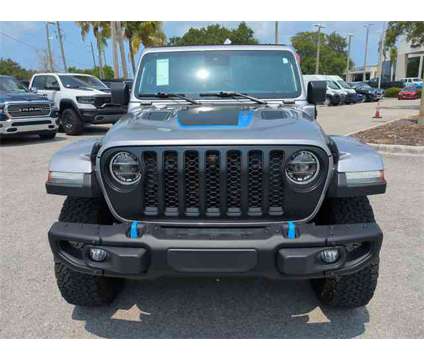 2021 Jeep Wrangler Unlimited Rubicon 4xe is a Silver 2021 Jeep Wrangler Unlimited Rubicon SUV in Naples FL