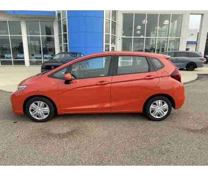 2020 Honda Fit LX is a Orange 2020 Honda Fit LX Car for Sale in Vicksburg MS