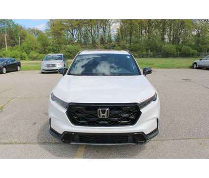 2024 Honda CR-V Hybrid Sport is a Silver, White 2024 Honda CR-V Hybrid in Bay City MI