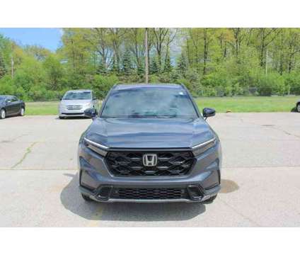 2024 Honda CR-V Hybrid Sport-L is a Grey 2024 Honda CR-V Hybrid in Bay City MI