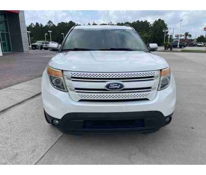 2011 Ford Explorer Limited is a Silver, White 2011 Ford Explorer Limited Car for Sale in Moss Point MS