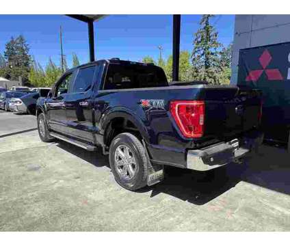 2022 Ford F-150 XLT is a Blue 2022 Ford F-150 XLT Truck in Portland OR
