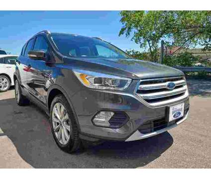 2018 Ford Escape Titanium is a Silver 2018 Ford Escape Titanium SUV in Warrensburg MO