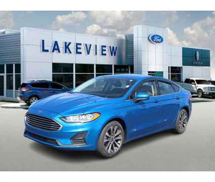 2020 Ford Fusion SE is a Blue 2020 Ford Fusion SE Sedan in Battle Creek MI