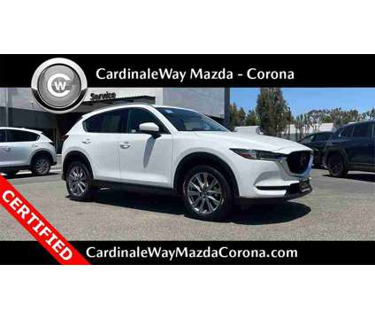 2021 Mazda CX-5 Grand Touring is a White 2021 Mazda CX-5 Grand Touring SUV in Corona CA