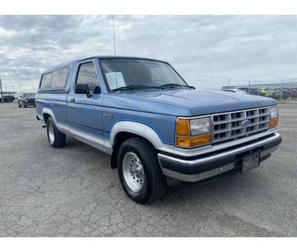 1990 Ford Ranger XLT is a Blue 1990 Ford Ranger XLT Truck in Council Bluffs IA