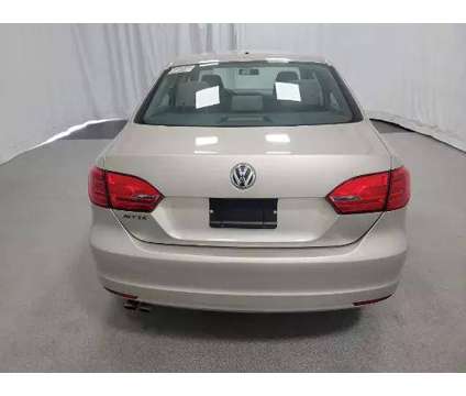 2014 Volkswagen Jetta for sale is a Tan 2014 Volkswagen Jetta 2.5 Trim Car for Sale in Charlotte NC