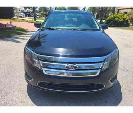 2012 Ford Fusion for sale is a Black 2012 Ford Fusion Car for Sale in Pompano Beach FL