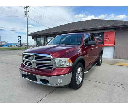 2014 Ram 1500 Quad Cab for sale is a Red 2014 RAM 1500 Model Car for Sale in Fremont NE