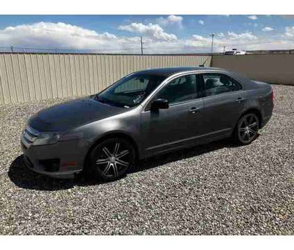 2011 Ford Fusion for sale is a Grey 2011 Ford Fusion Car for Sale in Farmington NM