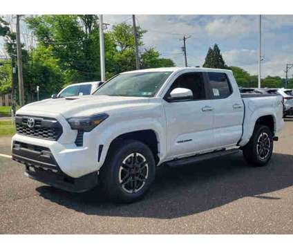 2024 Toyota Tacoma TRD Sport Double Cab 5' Bed AT is a Silver 2024 Toyota Tacoma TRD Sport Car for Sale in Trevose PA