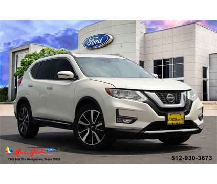 2018 Nissan Rogue Sl is a White 2018 Nissan Rogue SL Car for Sale in Georgetown TX