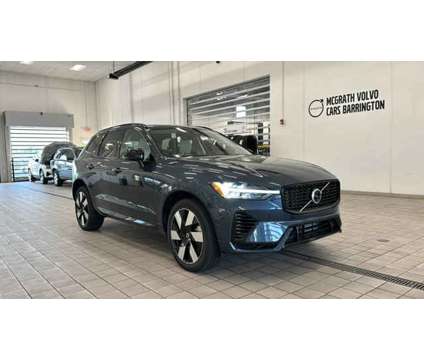 2024 Volvo XC60 Recharge Plug-In Hybrid Plus Dark Theme is a Blue 2024 Volvo XC60 3.2 Trim Hybrid in Barrington IL