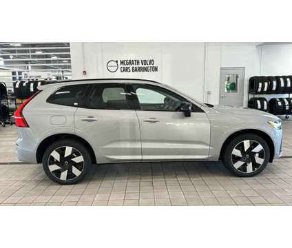 2024 Volvo XC60 Recharge Plug-In Hybrid Plus Dark Theme is a Silver 2024 Volvo XC60 3.2 Trim Hybrid in Barrington IL