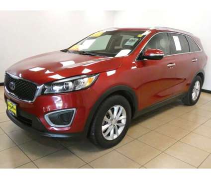 2016 Kia Sorento LX is a Red 2016 Kia Sorento LX Car for Sale in Saint Louis MO