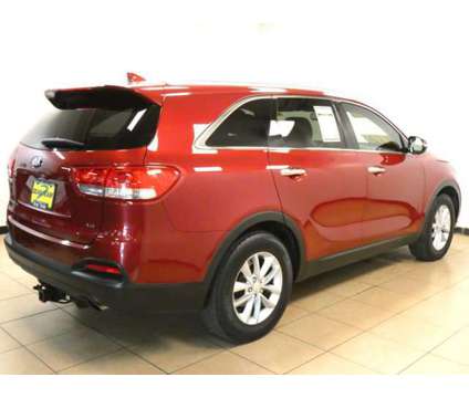 2016 Kia Sorento LX is a Red 2016 Kia Sorento LX Car for Sale in Saint Louis MO