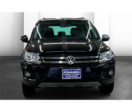 2014 Volkswagen Tiguan is a Black 2014 Volkswagen Tiguan Car for Sale in Capitol Heights MD
