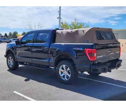 2021 Ford F-150 XLT is a Blue 2021 Ford F-150 XLT Car for Sale in Denver CO