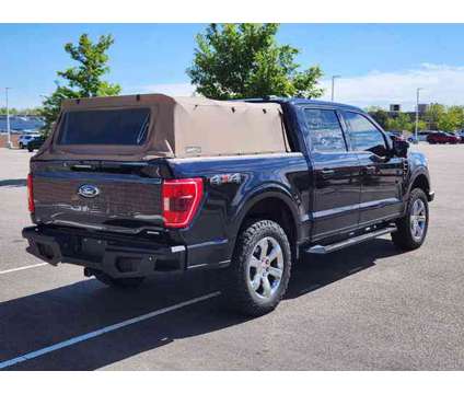 2021 Ford F-150 XLT is a Blue 2021 Ford F-150 XLT Car for Sale in Denver CO