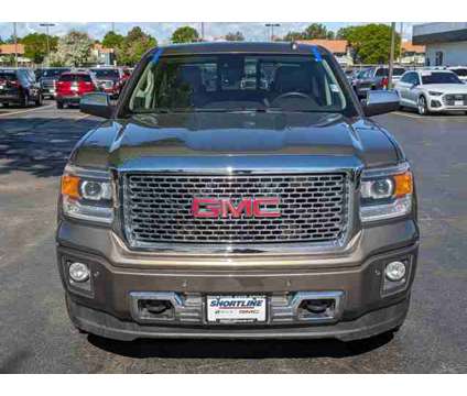 2015 GMC Sierra 1500 Denali is a Tan 2015 GMC Sierra 1500 Denali Car for Sale in Aurora CO