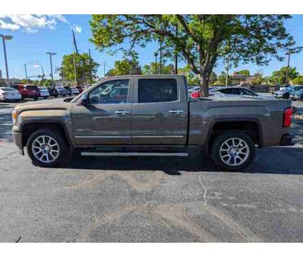 2015 GMC Sierra 1500 Denali is a Tan 2015 GMC Sierra 1500 Denali Car for Sale in Aurora CO