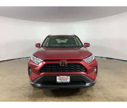 2021 Toyota RAV4 XLE Premium is a Red 2021 Toyota RAV4 XLE Car for Sale in Peoria IL